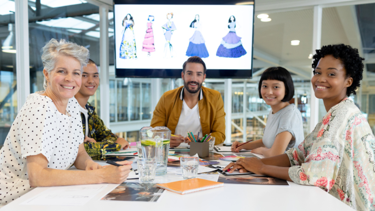 Front view of diverse business people discussing in the meeting at conference room in office