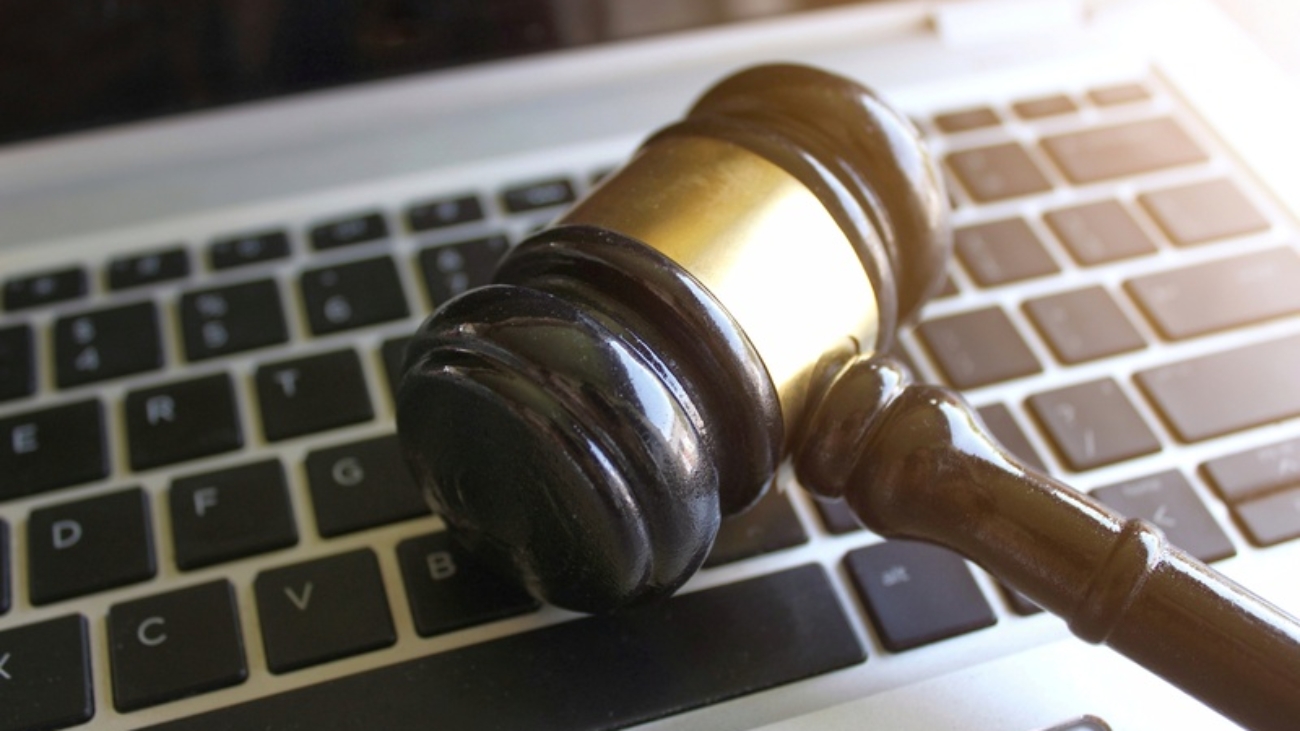 Selective focus image of judge gavel and keyboard. Cybercrime, legal, law and online auction concept