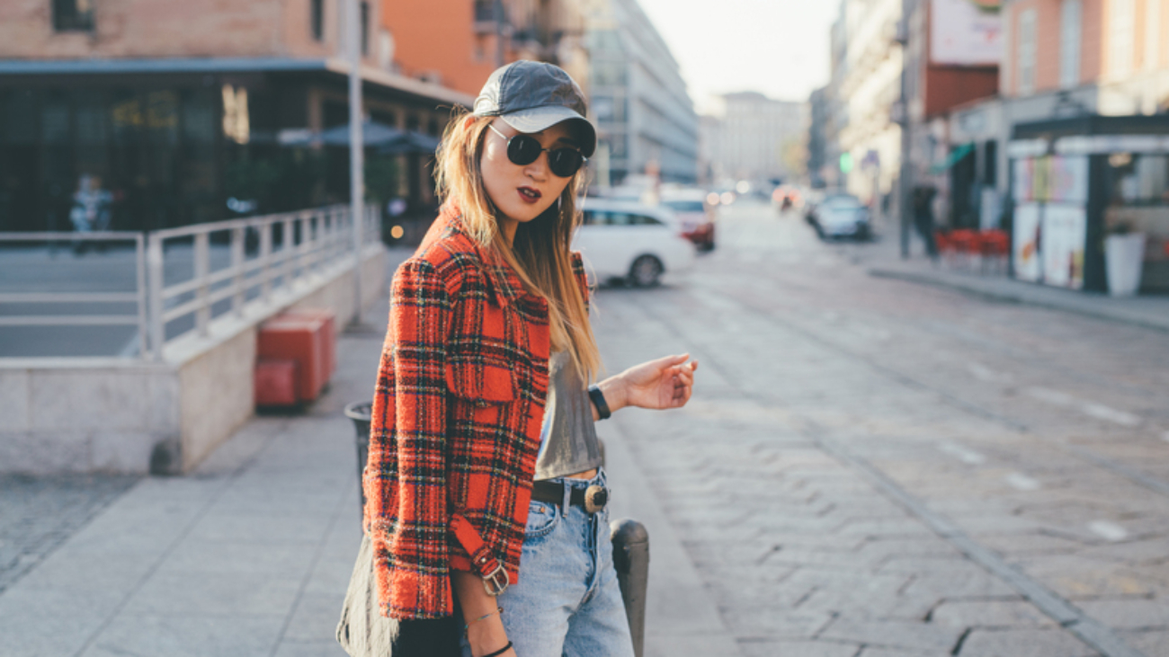 young woman outdoors posing looking away - blogger, influence, youth culture